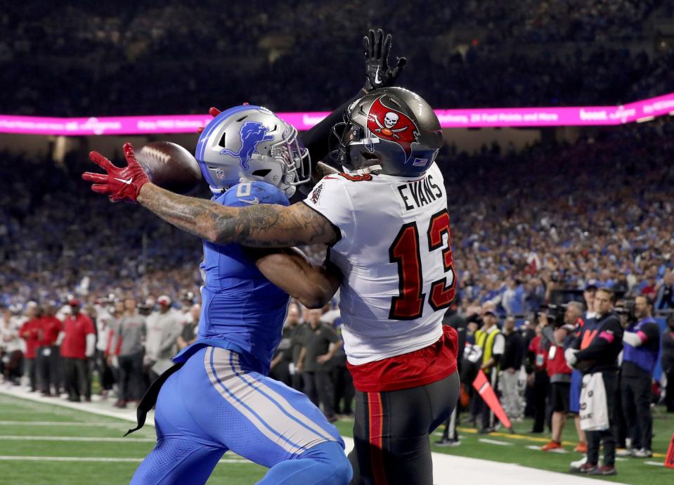 Detroit Lions safety Ifeatu Melifonwu stops Tampa Bay Buccaneers receiver Mike Evans from catching this 2-point conversion with four minutes left in the fourth quarter in the NFC divisional round at Ford Field on Sunday, Jan. 21, 2024.