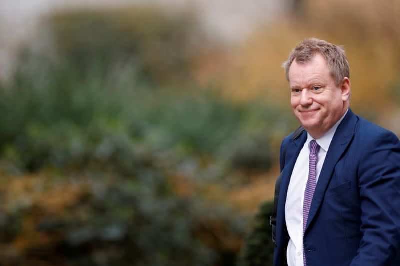 FILE PHOTO: David Frost walks outside Downing Street in London