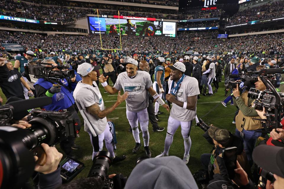 Jan 29, 2023; Philadelphia, Pennsylvania, USA; Philadelphia Eagles wide receiver DeVonta Smith (6), quarterback Jalen Hurts (1) and wide receiver A.J. Brown (11) after win against the San Francisco 49ers in the NFC Championship game at Lincoln Financial Field. Mandatory Credit: Bill Streicher-USA TODAY Sports