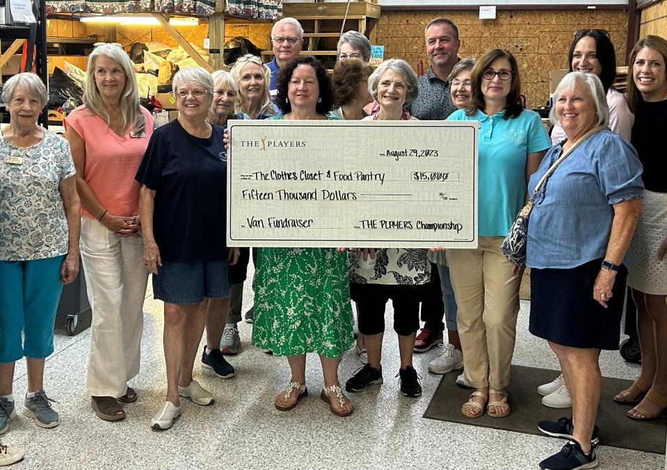 Volunteers of The Clothes Closest gathered on Aug. 29 in Orange Park to accept a $15,000 donation from The Players Championship.