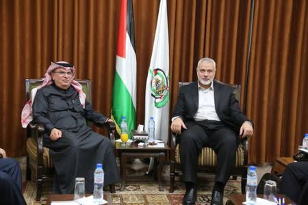 Hamas Chief Ismail Haniyeh meets with Qatari envoy Mohammed Al-Emadi in Gaza City January 24, 2019. Ahmed Shaat/Courtesy of Hamas Chief Media Office/Handout via REUTERS