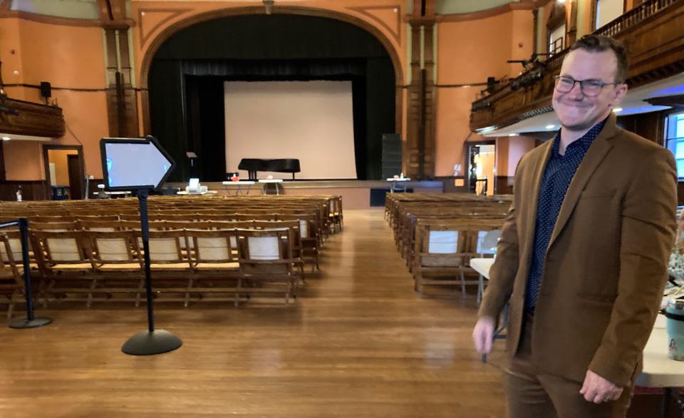 Provincetown Town Clerk Emmet Catanese stands inside the empty Town Hall auditorium early Tuesday where voting was to be held for the state primary. There are 3,390 registered voters in Provincetown, and 473 voters chose mail-in and early voting options, Cantanese said.