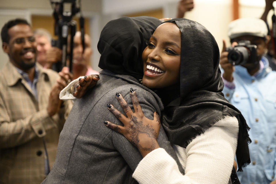 St. Louis Park Mayor-elect Nadia Mohamed is embraced by a supporter after winning her election Tuesday, Nov. 7, 2023, at the Westwood Hills Nature Center in St. Louis Park, Minn. (Aaron Lavinsky/Star Tribune via AP)