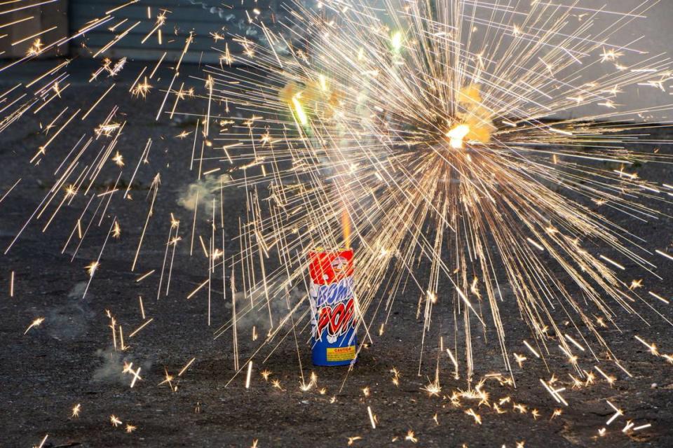 “Bomb Pop” sparks in the sky and against the ground on Monday.