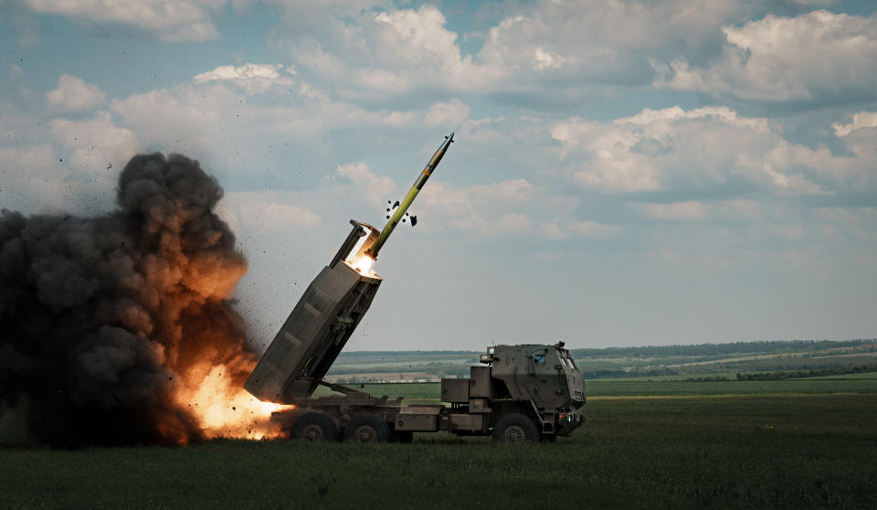 An M142 HIMARS launches a rocket on the Bakhmut direction on May 18, 2023 in Donetsk Oblast, Ukraine. Ukraine received the HIMARS as part of international military assistance programs to help defend itself against the ongoing Russian invasion. (Serhii Mykhalchuk/Global Images Ukraine via Getty Images)