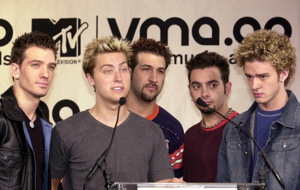 FILE - In this July 25, 2000 file photo, Members of the musical group *NSYNC, from left, JC Chasez, Lance Bass, Joey Fatone, Chris Kirkpatrick, and Justin Timberlake, appear at a New York news conference announcing that the group has been nominated and will perform during the MTV Video Music Awards.*NSYNC was one of the most popular boy bands in the world, selling millions of albums and dominating the music scene in the 90s and 2000s with other groups like the Backstreet Boys. (AP Photo/Kathy Willens, file)