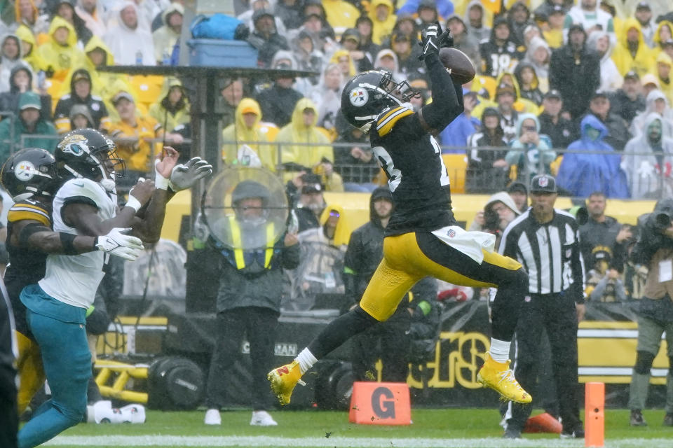 Pittsburgh Steelers safety Damontae Kazee (23) intercepts a pass by Jacksonville Jaguars quarterback Trevor Lawrence during the first half of an NFL football game Sunday, Oct. 29, 2023, in Pittsburgh. (AP Photo/Gene J. Puskar)