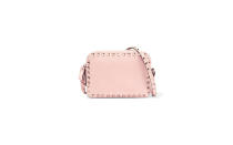 <p>A mini-tribute to the rock-romance language Valentino has been speaking so fluently as of late, this cross-body pairs baby-pink leather with the labels signature studs.</p><p>To buy: <a rel="nofollow noopener" href="http://click.linksynergy.com/fs-bin/click?id=93xLBvPhAeE&subid=0&offerid=254156.1&type=10&tmpid=6894&RD_PARM1=https%3A%2F%2Fwww.net-a-porter.com%2Fus%2Fen%2Fproduct%2F724822&u1=TL-crossbodybags" target="_blank" data-ylk="slk:netaporter.com;elm:context_link;itc:0;sec:content-canvas" class="link ">netaporter.com</a>, $1,395.</p>