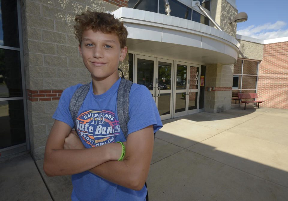 Braylon Price, 13, on his way home from Bellefonte Middle School Wednesday, Aug. 31, 2022 in Bellefonte, Pa. Braylon was among more than 45,000 Pennsylvania students whose parents elected to take advantage of a new state pandemic-era law option of holding their child back a year in school. Braylon repeated the sixth grade. (AP Photo/Gary M. Baranec)