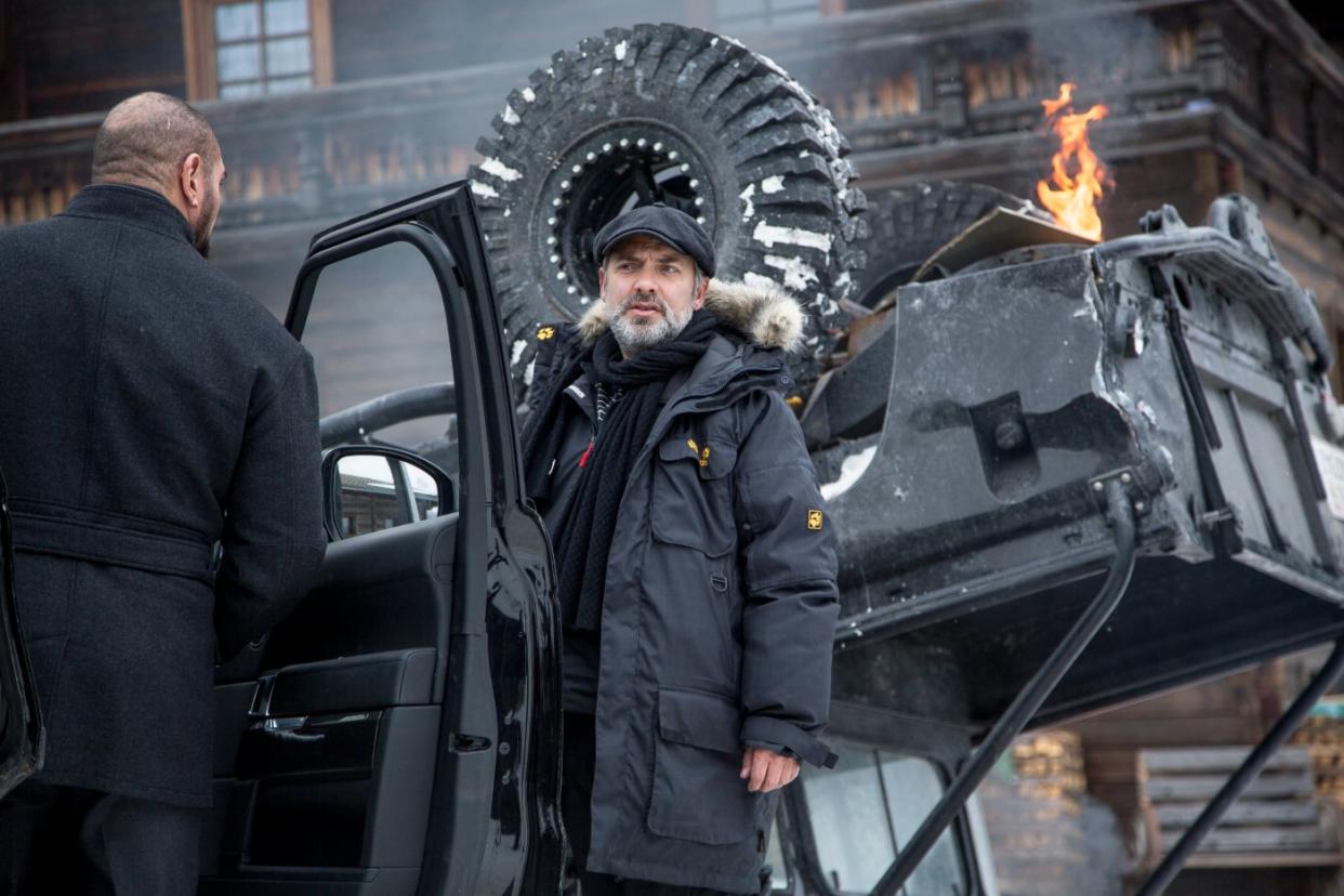 Sam Mendes on the set of Spectre (Credit: Sony)
