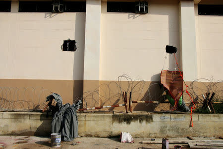 Square holes in the wall of a detention center are seen near the Thailand-Malaysia border in Hatyai, Thailand, November 20, 2017. Dailynews/ via REUTERS