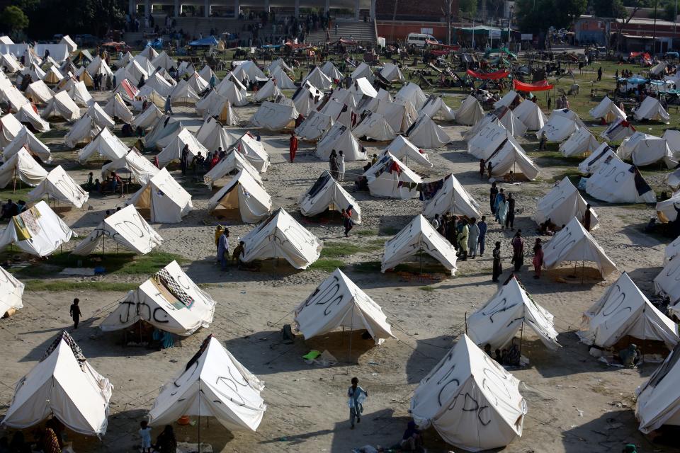 Temporary housing is constructed for flood victims, in Larkana District, of Sindh, Pakistan, Thursday, Sept. 8, 2022. The unprecedented deluge, which began in mid-June, has triggered landslides and collapsed houses, killing over 1,350 people and leaving over 600,000 homeless in Pakistan.