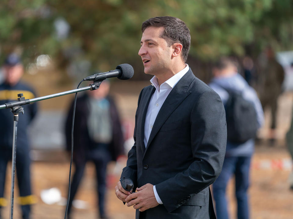 Ukrainian President Volodymyr Zelenskiy speaks to soldiers during his visit to military base outside Kyiv, Ukraine, Monday, Sept. 30, 2019. Ukraine's president says to media his country won't be pressured into opening an investigation into Democratic presidential candidate Joe Biden and his son. (Ukrainian Presidential Press Office via AP)