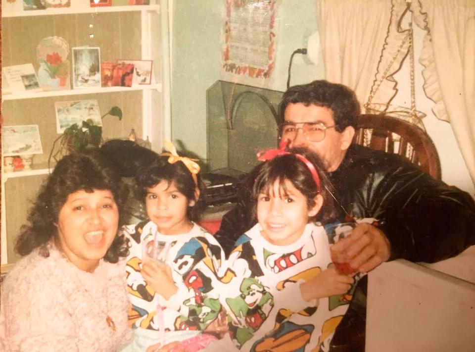 Jessica Hoppe and sister, Karla, as young children wearing matching Mickey Mouse outfits with their mother and father. (Photo courtesy of Jessica Hoppe)