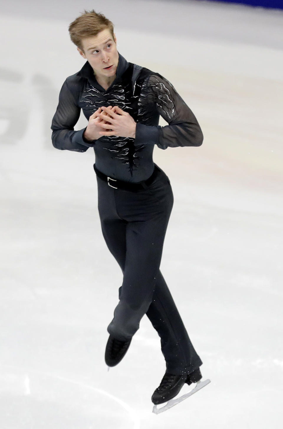 Russia's Alexander Samarin performs in the men's short program at the ISU European figure skating championships in Minsk, Belarus, Thursday, Jan. 24, 2019. (AP Photo/Sergei Grits)