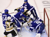 Boston Bruins left wing Nick Ritchie (21) scores on Tampa Bay Lightning goaltender Andrei Vasilevskiy (88) during a scramble in front of the net during the first period of Game 2 of an NHL hockey second-round playoff series, Tuesday, Aug. 25, 2020, in Toronto. (Frank Gunn/The Canadian Press via AP)