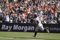 San Francisco Giants' Donovan Solano rounds the bases after hitting a two-run home run against the Oakland Athletics during the eighth inning of a baseball game in Oakland, Calif., Sunday, Aug. 22, 2021. (AP Photo/Jeff Chiu)