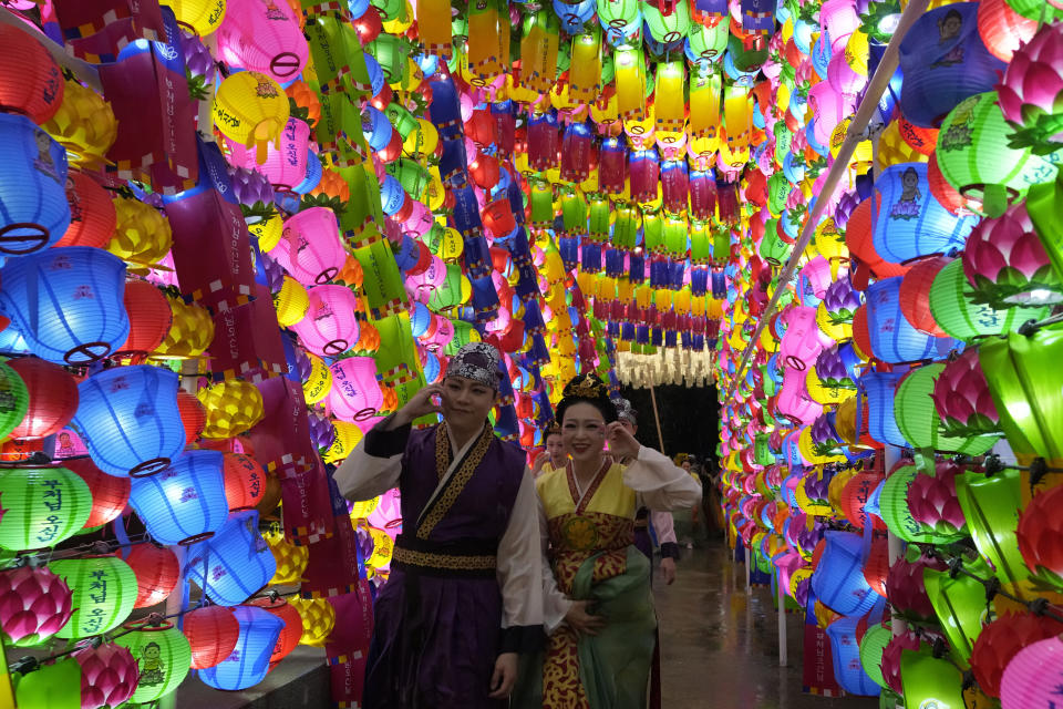 Buddhists walk past lanterns during the Lotus Lantern Festival, ahead of the birthday of Buddha at Dongguk University in Seoul, South Korea, Saturday, May 11, 2024. (AP Photo/Ahn Young-joon)