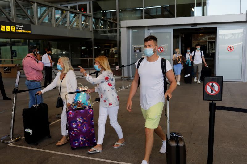 Tourists arrive at Malaga-Costa del Sol Airport, in Malaga