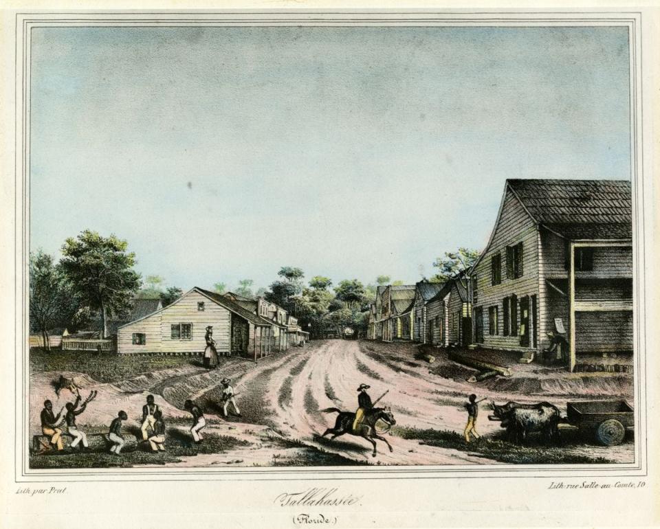 Lithograph looking east on Jefferson from Adams Street in 1839. The building to the right was the Planter's Inn, which burned to the ground in the 1843 fire.