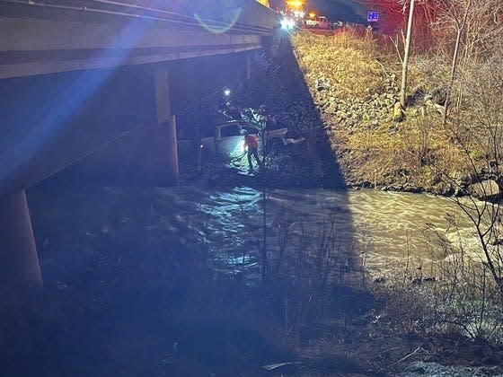 Reum's truck seen next to the creek during the rescue.