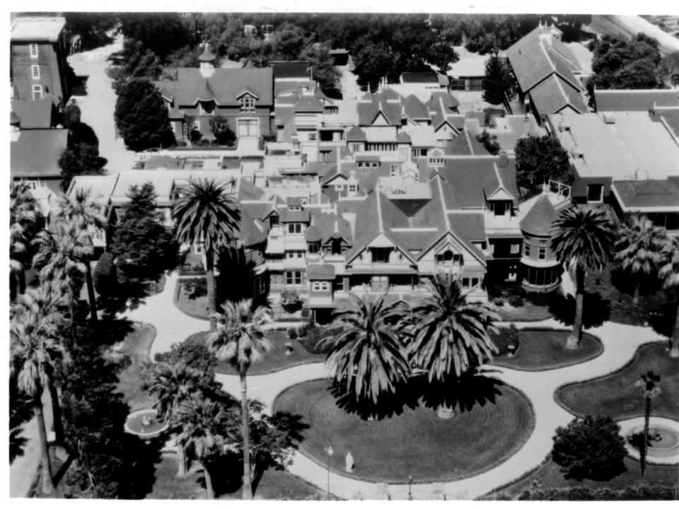 black and white aerial shot of winchester house