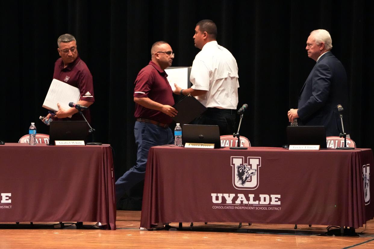 The Uvalde school board breaks for a closed session to consider firing school police chief Pete Arredondo during the board's meeting  Wednesday at Uvalde High School. The school boarded decided to fire Arredondo. 
(Photo: BRIANA SANCHEZ/AMERICAN-STATESMAN)