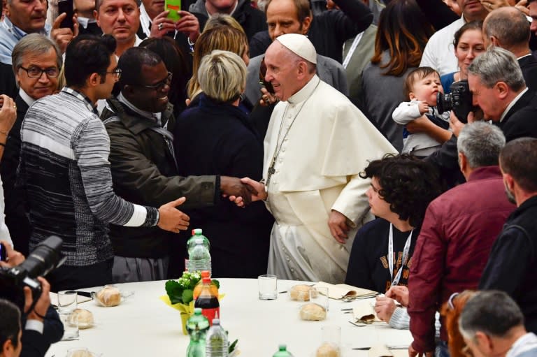 Pope Francis denounce a world in which "the wealthy few feast on what, in justice, belongs to all"