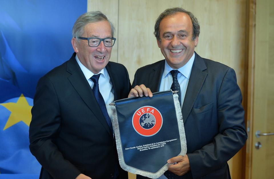 BRUSSELS, BELGIUM - SEPTEMBER 10:  European Commission President Jean Claude Juncker (L) and the UEFA President Michel Platini (R) pose for the photographers during their meeting at the EU Commission headquarters in Brussels, Belgium, 10 September 2015. (Photo by Dursun Aydemir/Anadolu Agency/Getty Images)