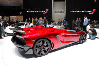 Starting with the everyday 700-hp Aventador, Lamborghini taunted the bull even further by removing the roof, adding several aerodynamic panels and generally shucking weight from a car that only had 3,472 lbs. to begin with. Even the seat fabrics have been swapped for something Lamborghini calls "Carbonskin," a fabric made from carbon fibers that's at least a decade away from being used on a teenager's hat. With no windshield, the interior has to get some form of waterproofing; the rear mirror pops up like Wall-E's head from the center of the dash. It and the roll bars behind the driver are the highest points in the car.