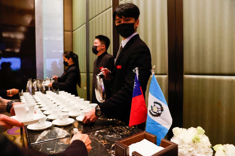 A Taiwan and Guatemala flag can be seen at an investment event in Taipei