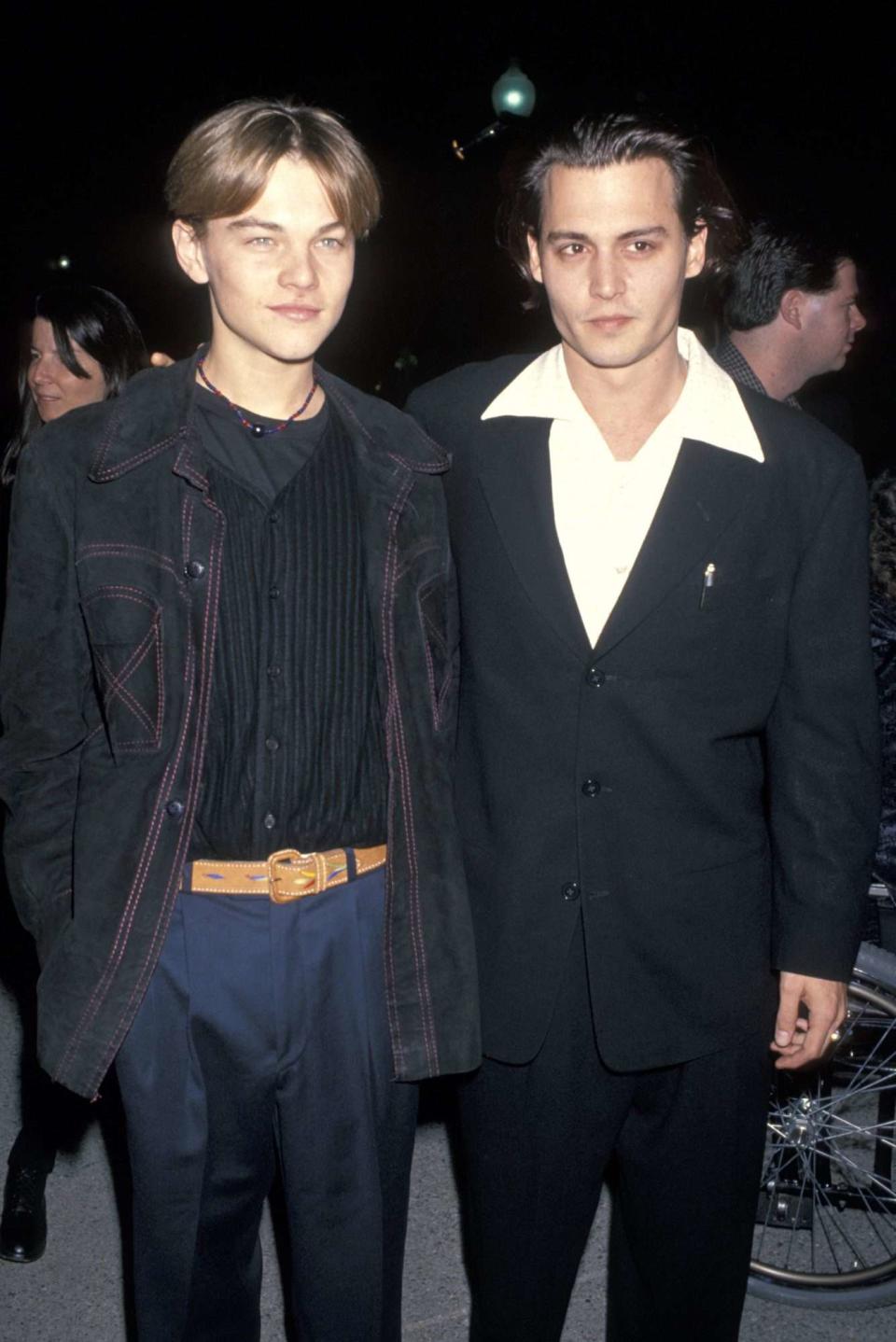 <p>Pictured here with <em>What's Eating Gilbert Grape</em> costar Johnny Depp in 1993, DiCaprio attended an event for their film — which garnered the young actor critical acclaim and his first Oscar nod.</p>