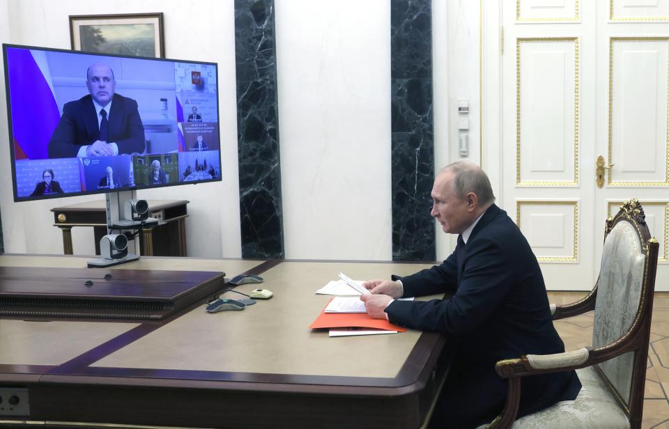 Russian President Vladimir Putin attends a meeting on economic issues via videoconference at the Kremlin in Moscow, Russia, Thursday, May 12, 2022. (Mikhail Metzel, Sputnik, Kremlin Pool Photo via AP)