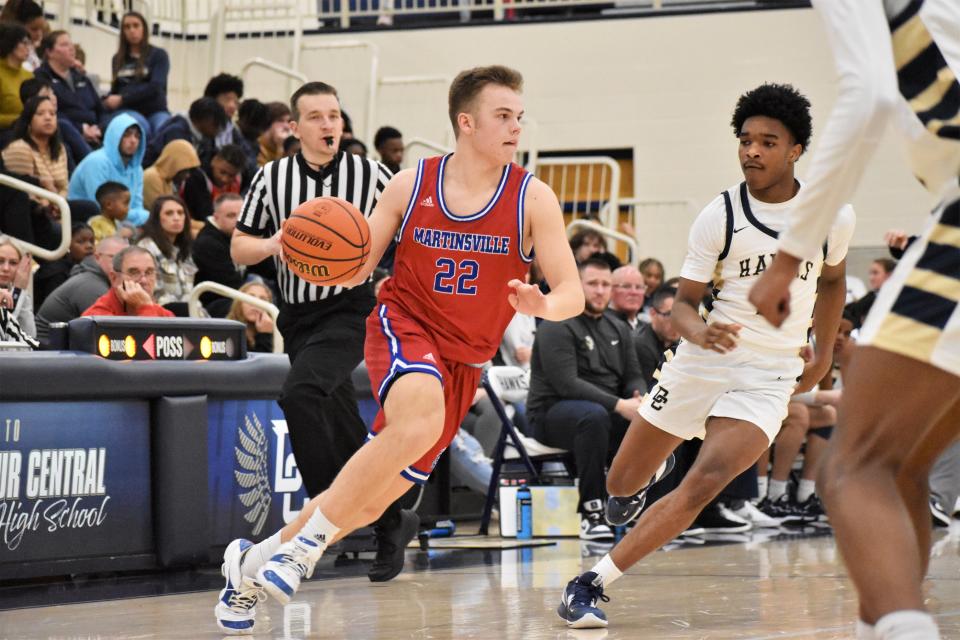 Martinsville's Grady Gardner (22) drives into the paint during the Artesians' matchup with Decatur Central on Jan. 6, 2023.