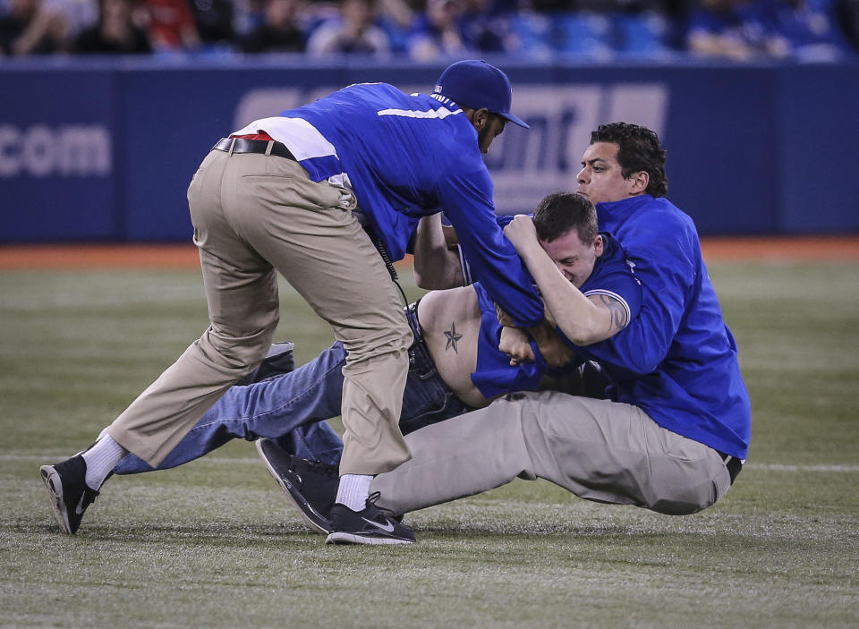 Blue Jays got some more comic relief when a 2nd fan ran out on the field with the Sox leading 13-0 in the bottom of the 9th during the game between the Toronto Blue Jays and the Boston Red Sox at The Rogers Centre on April 7, 2013. (Photo by David Cooper/Toronto Star)