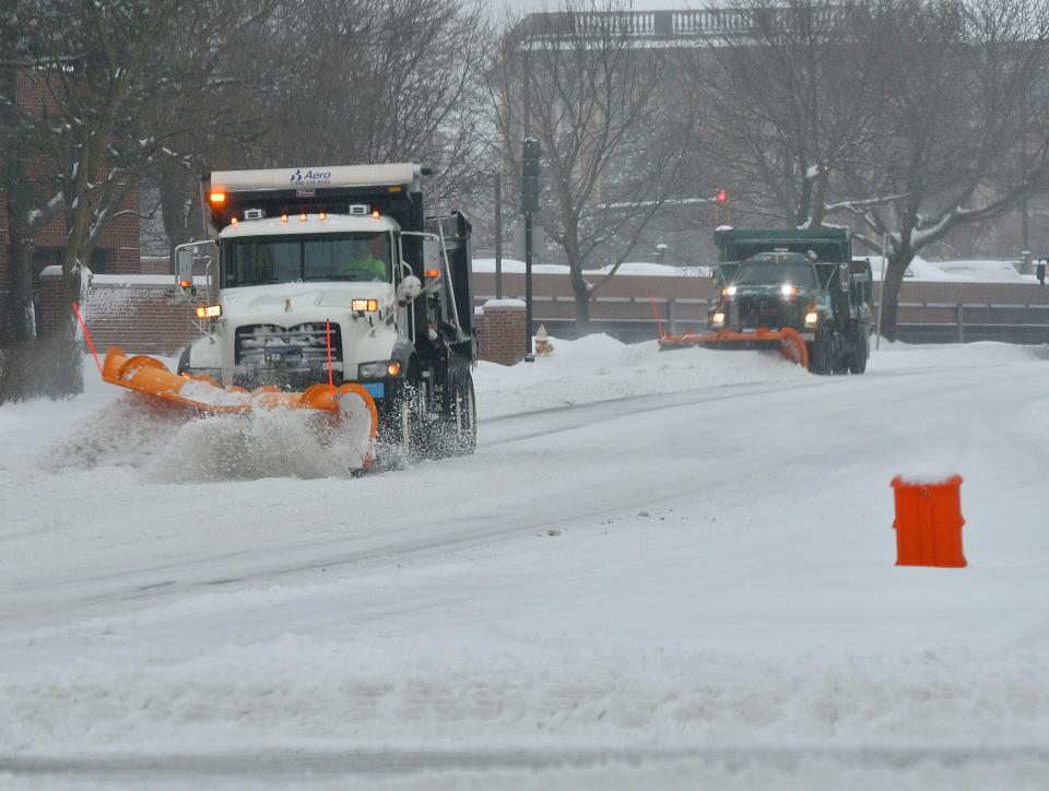 City snowplows clear Major Taylor Blvd. during a snowstorm in Worcester last February.