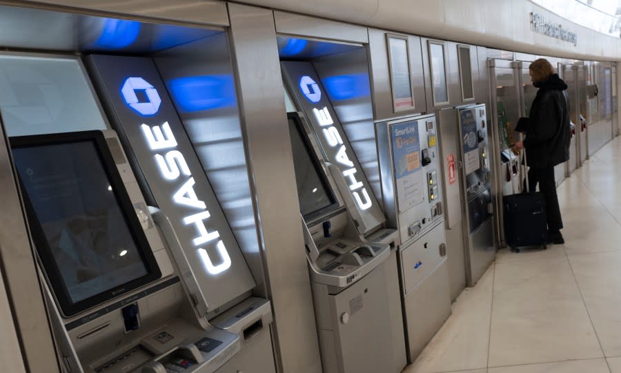 FILE - Chase Bank ATMs are shown, Thursday, March 25, 2021, in New York. (AP Photo/Mark Lennihan, File)