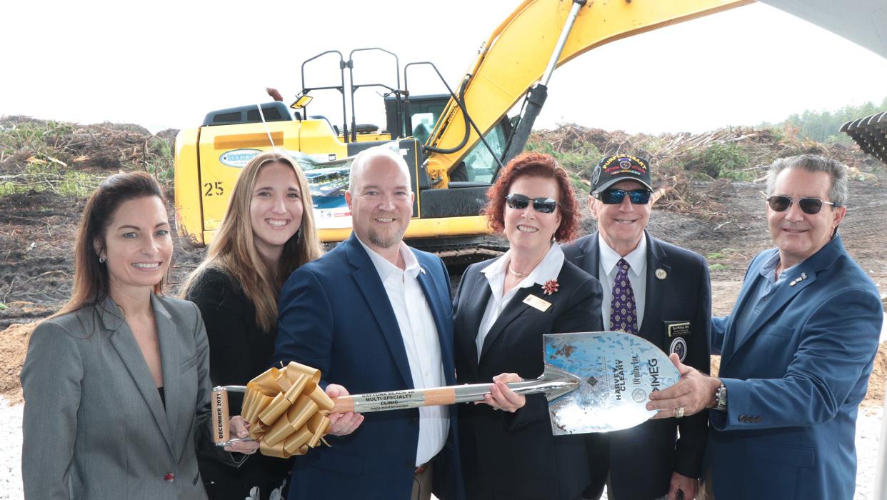 Dr. Nicole Robinson, Brandi Anderson, Timothy Cooke, Sue Bower, Rodney Phillips and Ernest Audino pose for photos at the groundbreaking of the Daytona Beach VA Multi-Specialty Clinic, Tuesday December 14, 2021 on Williamson Boulevard in Daytona Beach.