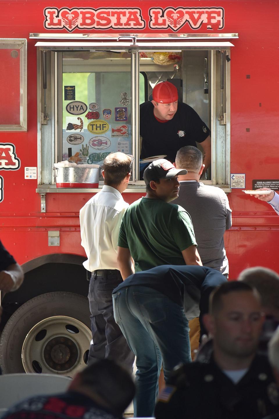 Chef Stephen Coe, whose accomplishments include winning against celebrity chef Bobby Flay on the Food Network’s “Chopped: Beat Bobby Flay,” at a Feed the First Responders event in Swansea.