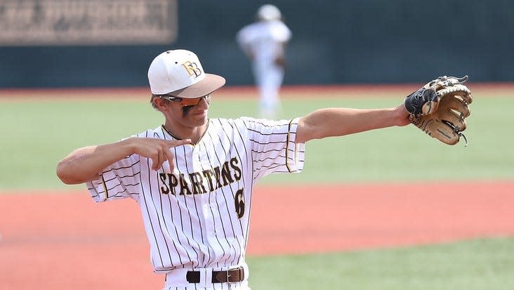 Roger Bacon sophomore infielder Kyle Hauser reacts in the June 2 Division III regional semifinal game with Reading.