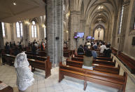 Catholics attends a mass while maintaining social distancing to help curb the spread of the coronavirus at the Myeongdong Cathedral in Seoul, South Korea, Sunday, May 17, 2020. (Lee Jung-hoon/Yonhap via AP)