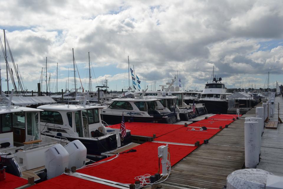 The red carpet is laid out on the docks at Perry Wharf ahead of the Newport International Boat Show.