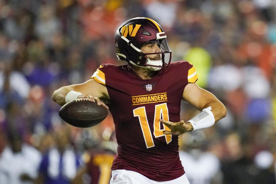 Commanders quarterback Sam Howell looks against the Baltimore Ravens.