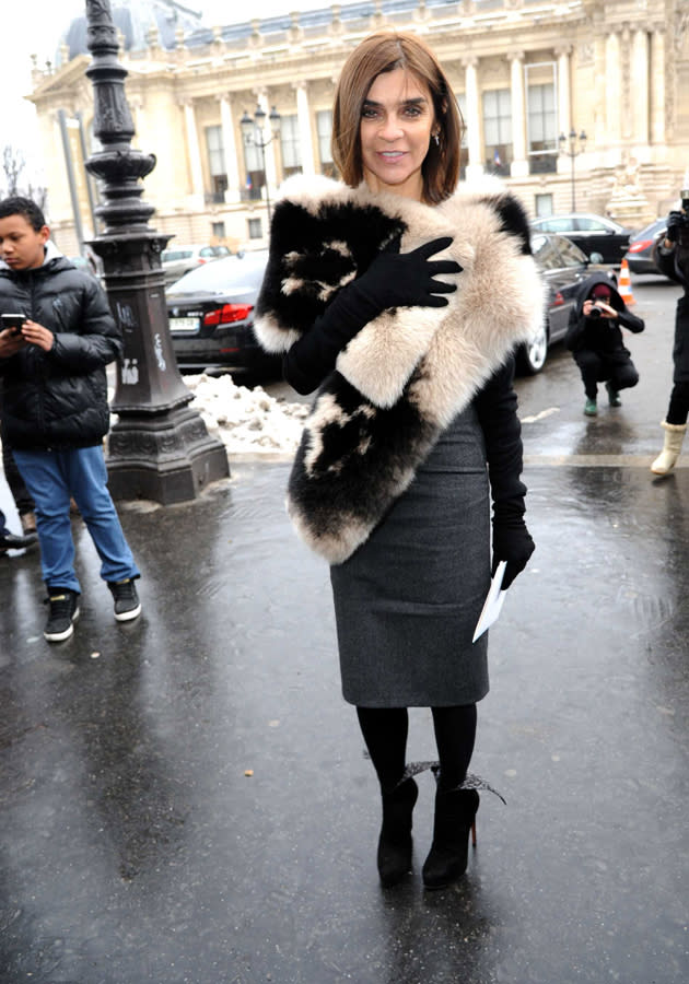 Carine Restoin-Roitfield wrapped up warm in a stole for her FROW arrival at Paris Haute Couture Fashion Week ©Rex