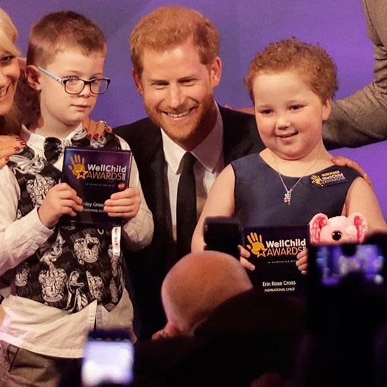 Prince Harry shows off paternal side at awards show