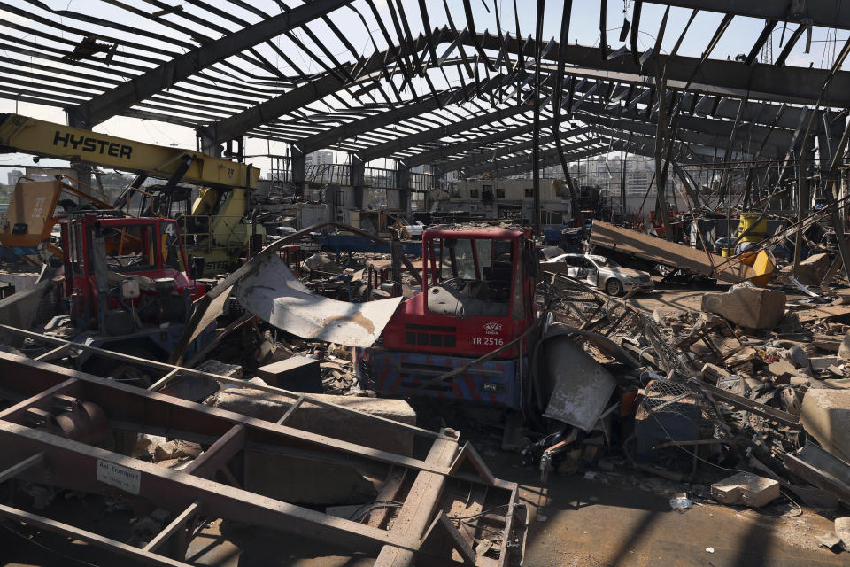 Equipment and Vehicles are destroyed at the site of the Aug. 4 explosion that hit the seaport of Beirut, Lebanon, Saturday, Aug. 15, 2020. (AP Photo/Bilal Hussein)