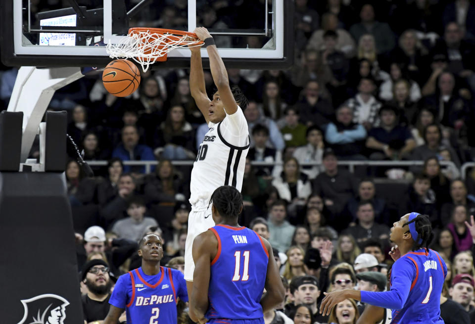 Providence's Rafael Castro dunks the ball during the first half of an NCAA college basketball game against DePaul, Saturday, Jan. 21, 2023, in Providence, R.I. (AP Photo/Mark Stockwell)