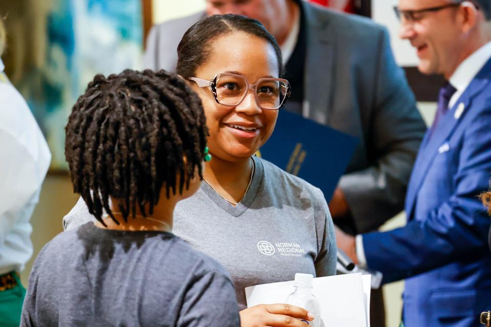 Shayla Taylor attends a remembrance Friday of the 10-year anniversary of the Moore tornado at Norman Regional Moore in Moore.