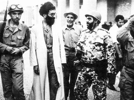 Iran's Supreme Leader Ayatollah Ali Khamenei (2nd L) speaks with soldiers at an undisclosed location during the Iran-Iraq war, in this undated handout image taken from the Leader's website. REUTERS/Leader.ir/Handout/Files