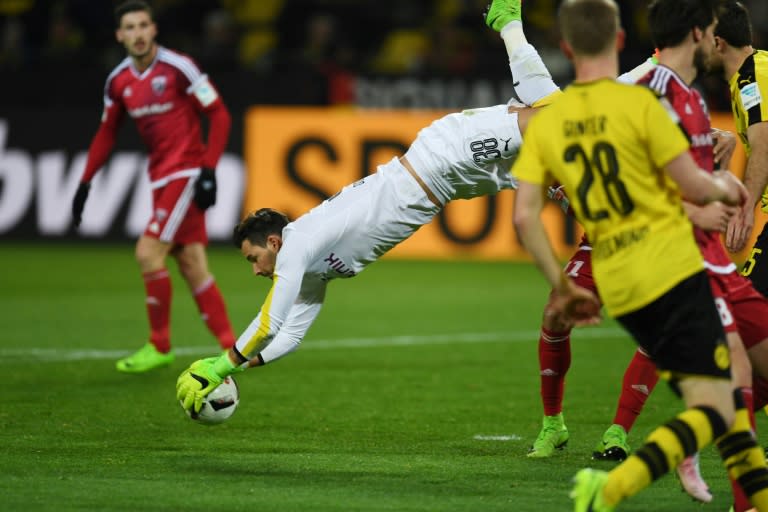 Dortmund's goalkeeper Roman Buerki grabs the ball during a Bundesliga football match against FC Ingolstadt on March 17, 2017